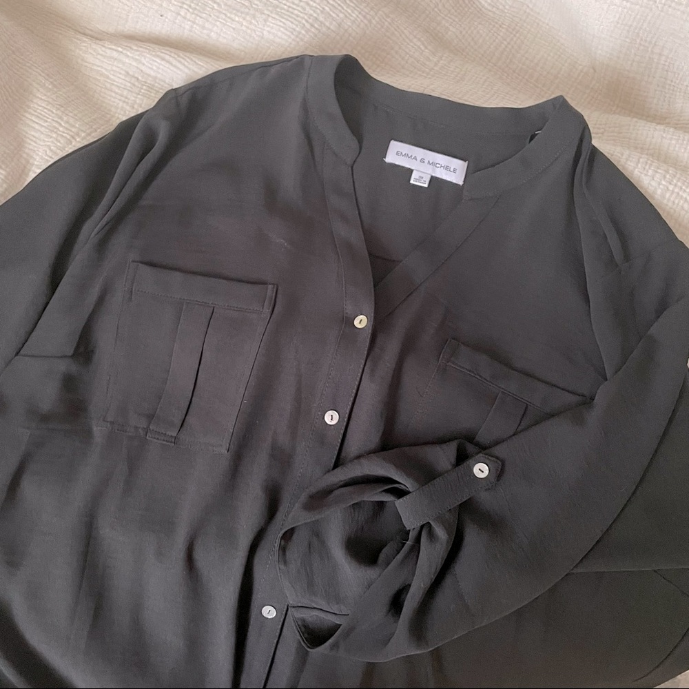 Black flowy low peplum dress with button details